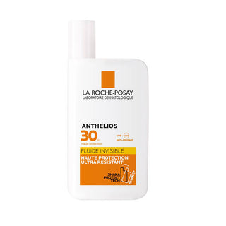 La Roche-Posay Anthelios Fluide Invisible SPF30 50 ml, protection solaire visage légère et invisible pour peaux sensibles, résistante à l'eau et à la transpiration.